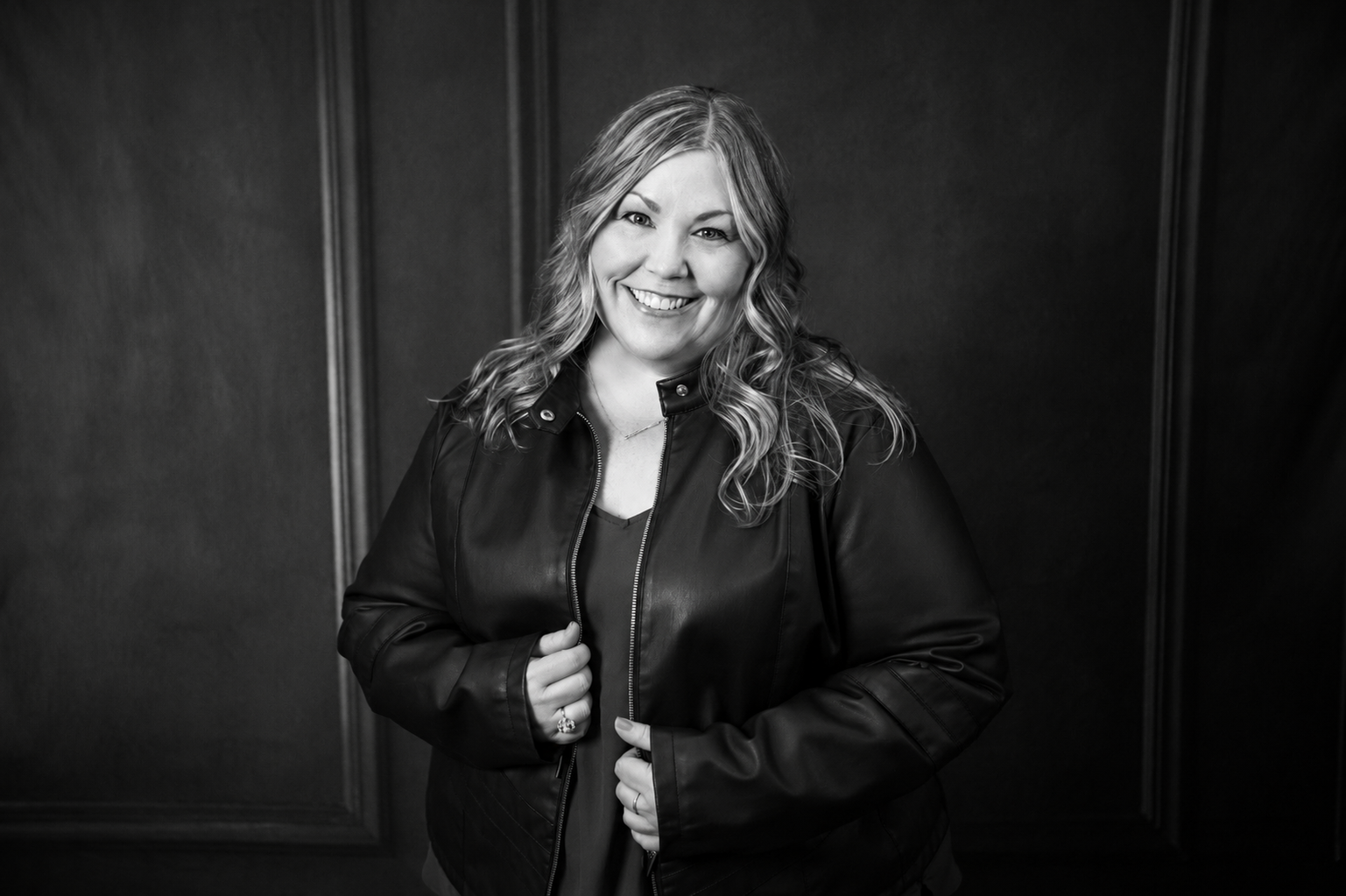 Black-and-white portrait of Christina Phillips, Director of HR & Company Operations at 3 Enrollment Marketing